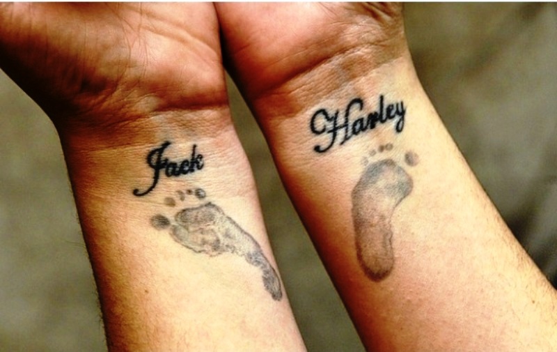 Attractive Baby Footprints Tattoo
