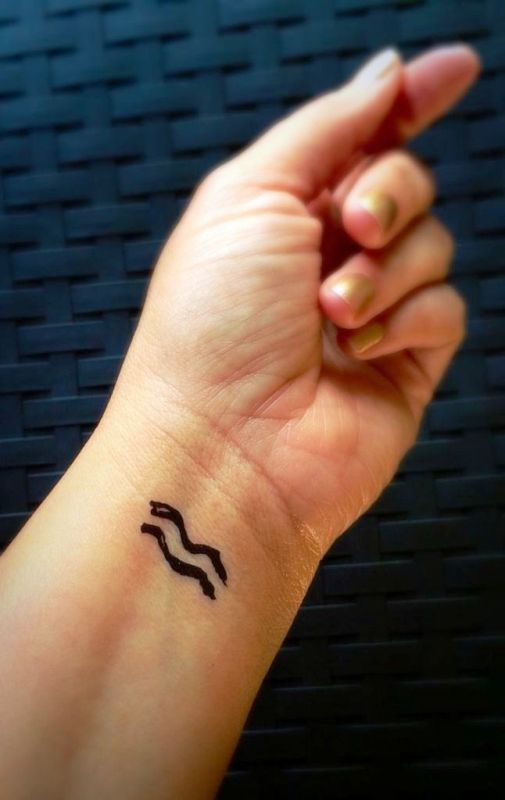 Black Aquarius Tattoo