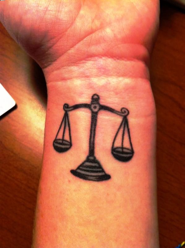 Black Libra Wrist Tattoo