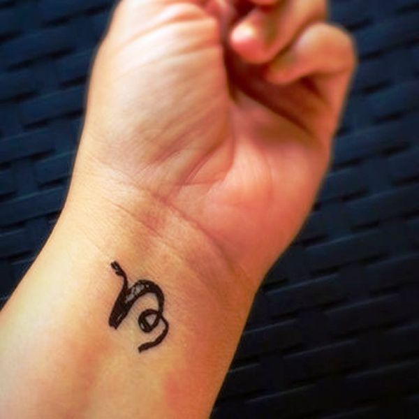 Capricorn Tattoo On Left Wrist