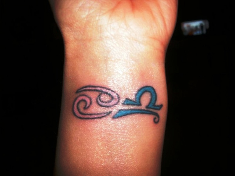 Colored Libra Tattoo On Wrist