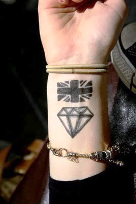 Flag And Diamond Tattoo On Wrist