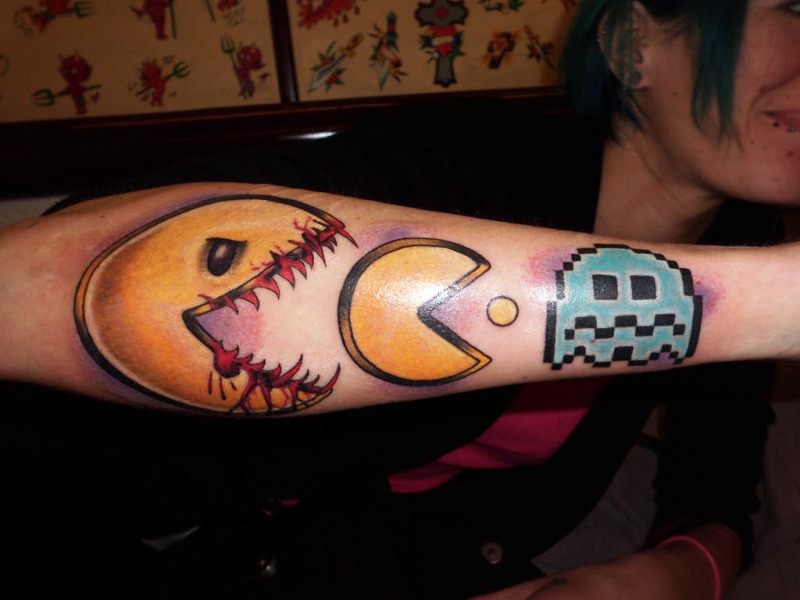 Impressive pacman Wrist Tattoo