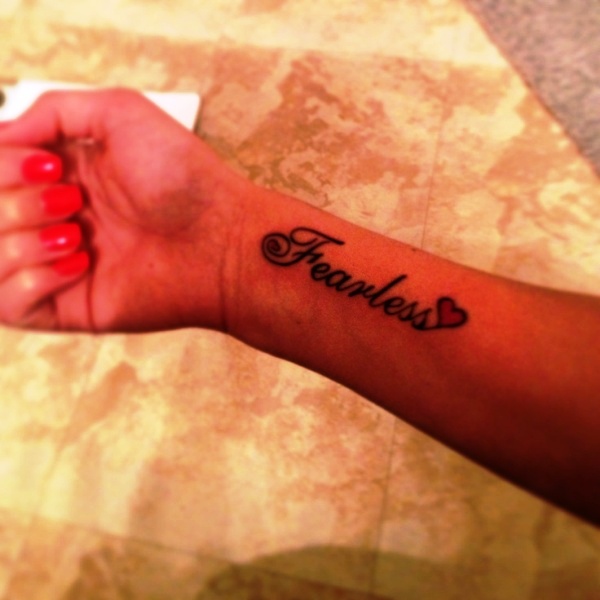 Large Fearless Wrist Tattoo