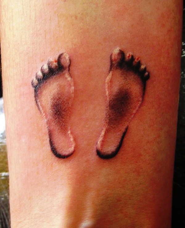 Lovely Baby Footprints Tattoo