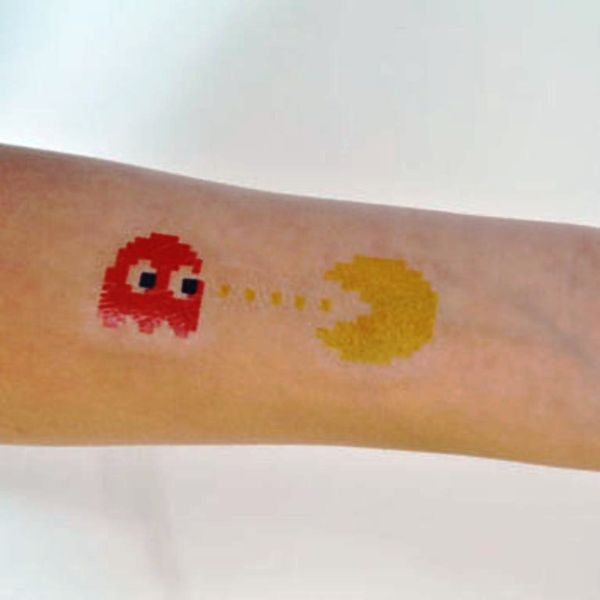 Red Yellow Pacman Wrist Tattoo