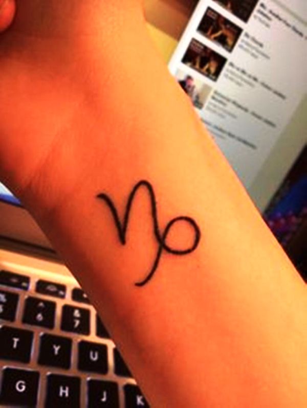 Simple Capricorn Tattoo On Wrist