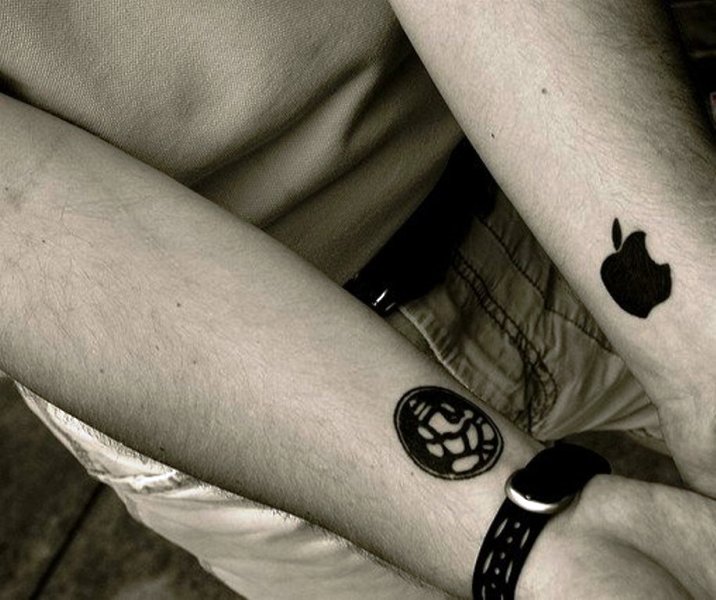 Stunning Apple Logo Tattoo On Wrist