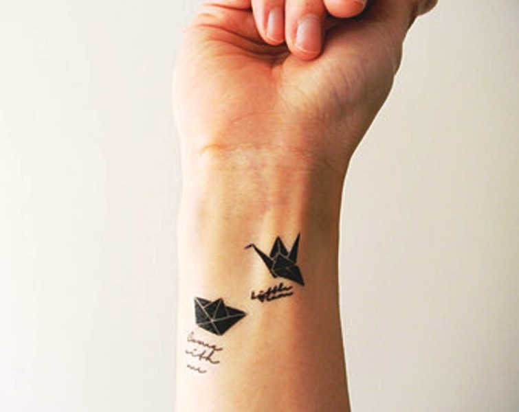 Stylish Plane Tattoo On Wrist
