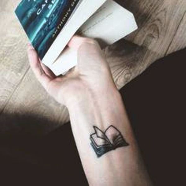 Sweet Book Tattoo On Wrist