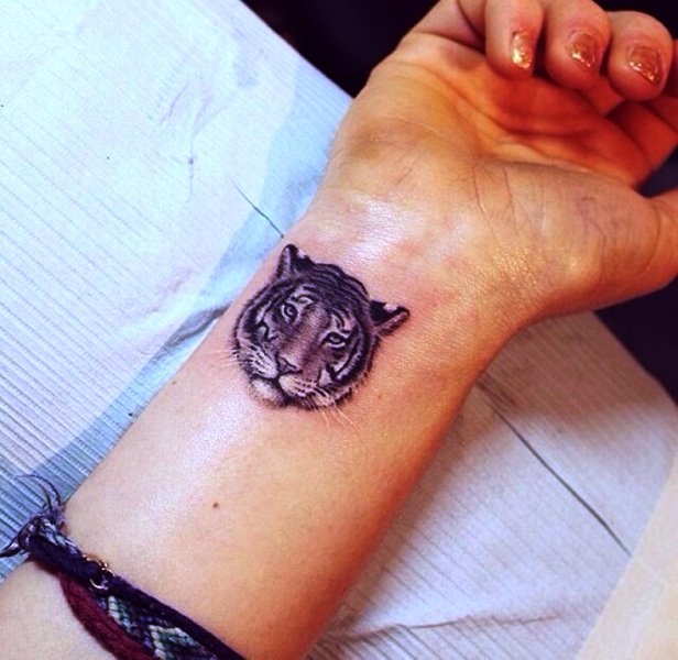 Tiger Face Tattoo On Wrist