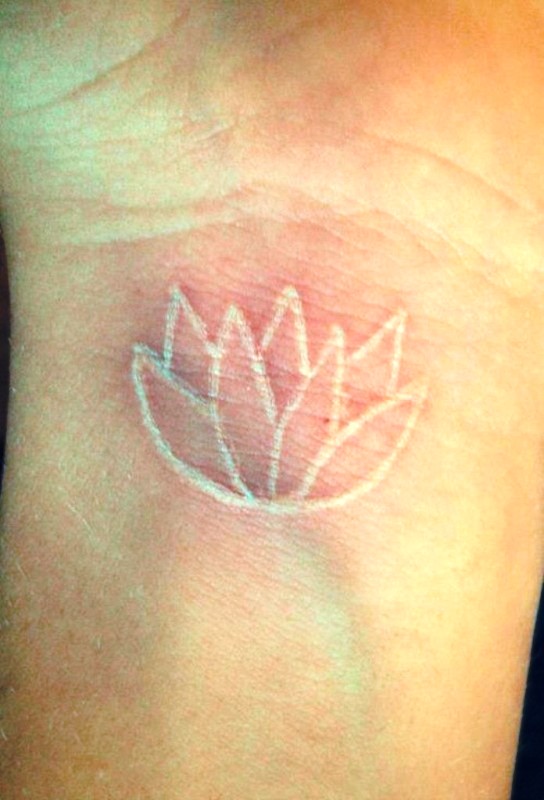 White Lotus Tattoo On Wrist